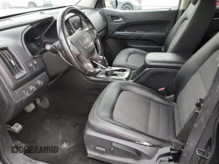 2018 GMC Canyon z VIN 1GTP6CE1XJ1173875, wystawiony jako Copart lot #47258005 z przebiegiem 104 076 mil mil oraz Szkoda całkowita • Salvage title. Historia ofert i sprzedaży dostępna na DreamBid. Obrazek 7.