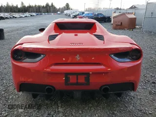 2017 Ferrari 488 z VIN ZFF80AMA6H0228173, wystawiony jako Copart lot #77401204 z przebiegiem 16 556 mil mil oraz Tytuł czysty. Historia ofert i sprzedaży dostępna na DreamBid. Obrazek 6.