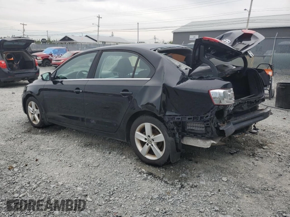 2014 Volkswagen Jetta Comfortline с VIN 3VWDL7AJ2EM366052, выставлен на аукционе Copart как лот 69010344 с пробегом 210 092 миль миль и Списание • Salvage title. История ставок и продаж доступна на DreamBid. Изображение 2.