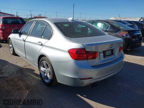 2012 BMW 3 Series 328i with VIN WBA3A5C5XCF345274, listed as a IAAI auction lot 41812072 with 142,024 mi miles. Bid and sale history available at carsss.com. Image 3.