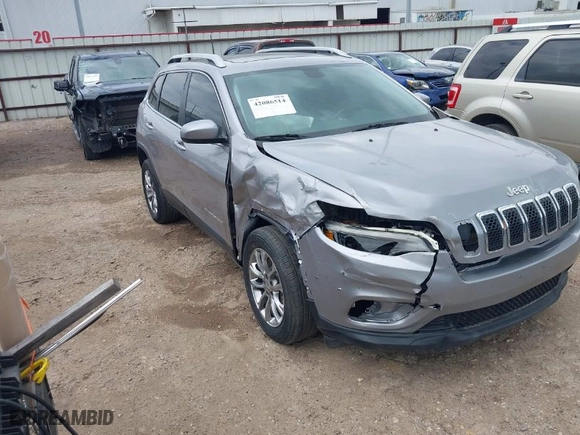2019 Jeep Cherokee Latitude Plus with VIN 1C4PJLLB5KD128613, listed as a IAAI auction lot 42086514 with 131,557 mi miles. Bid and sale history available at carsss.com. Image 1.