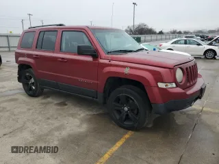 2014 Jeep Patriot Latitude with VIN 1C4NJPFA8ED818233, listed as a Copart auction lot 43947895 with 142,474 mi miles and Salvage Title. Bid and sale history available at carsss.com. Image 4.