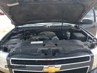 2007 Chevrolet Tahoe LT z VIN 1GNFC13JX7R114712, wystawiony jako Copart lot #62892205 z przebiegiem 295 890 mil mil oraz Szkoda całkowita • Salvage title. Historia ofert i sprzedaży dostępna na DreamBid. Obrazek 12.