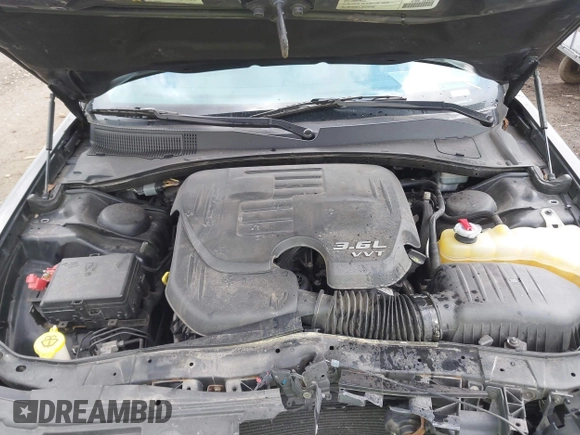 2015 Chrysler 300 with VIN 2C3CCAGGXFH831351, listed as a IAAI auction lot 41721941 with 106,577 mi miles. Bid and sale history available at carsss.com. Image 10.