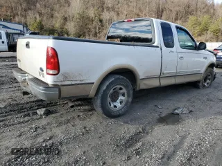1999 Ford F-250 with VIN 1FTRX27L9XKA27324, listed as a Copart auction lot 87019484 with 152,787 mi miles and Salvage title. Bid and sale history available at DreamBid. Image 3.
