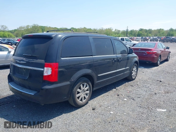 2014 Chrysler Town & Country Touring with VIN 2C4RC1BG4ER217711, listed as a IAAI auction lot 42155688 with 370,937 mi miles. Bid and sale history available at carsss.com. Image 4.