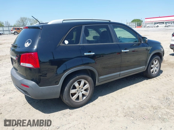 2011 Kia Sorento LX with VIN 5XYKT4A15BG183830, listed as a IAAI auction lot 42030175 with 210,713 mi miles. Bid and sale history available at carsss.com. Image 4.