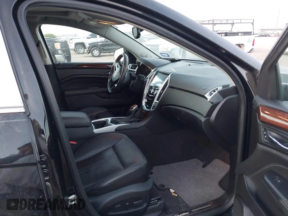 2013 Cadillac SRX Luxury Collection with VIN 3GYFNCE35DS651598, listed as a IAAI auction lot 41832768 with 85,565 mi miles. Bid and sale history available at carsss.com. Image 5.