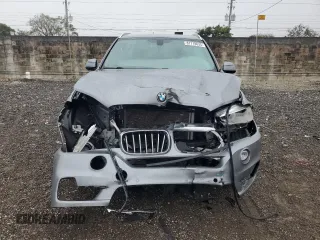 2017 BMW X5 sDrive35i with VIN 5UXKR2C36H0X04777, listed as a Copart auction lot 87718635 with 0 mi miles and Salvage Title. Bid and sale history available at carsss.com. Image 5.