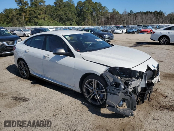 2020 BMW 2 Series M235i xDrive with VIN WBA13AL07L7F58999, listed as a Copart auction lot 77858084 with 19,833 mi miles and Salvage Title. Bid and sale history available at carsss.com. Image 4.