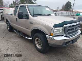 1999 Ford Super Duty F-250 XL with VIN 1FTNX20F0XEC90660, listed as a IAAI auction lot 41473096 with 435,452 mi miles. Bid and sale history available at carsss.com. Image 1.