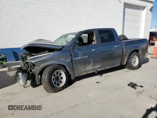 2012 Ram 1500 Outdoorsman with VIN 1C6RD7LT8CS335727, listed as a Copart auction lot 45923255 with 145,949 mi miles and Salvage Title. Bid and sale history available at carsss.com. Image 1.