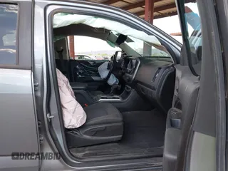 2021 Chevrolet Colorado 4WD LT with VIN 1GCGTCEN1M1107053, listed as a IAAI auction lot 42430796 with 76,128 mi miles and . Bid and sale history available at DreamBid. Image 5.
