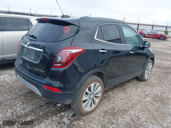 2018 Buick Encore Preferred with VIN KL4CJASB1JB549771, listed as a IAAI auction lot 40669021 with 83,570 mi miles. Bid and sale history available at carsss.com. Image 4.