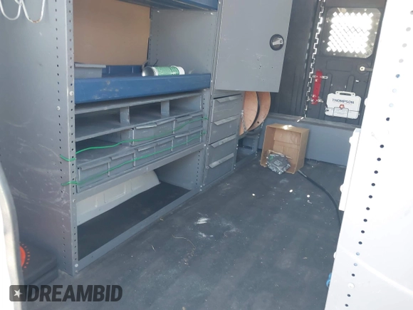 2012 Ford Econoline Cargo Commercial with VIN 1FTNE2EL8CDB10460, listed as a IAAI auction lot 41992576 with 137,224 mi miles and . Bid and sale history available at DreamBid. Image 8.