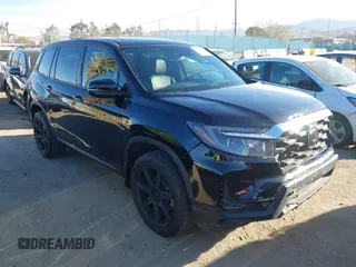 2022 Honda Passport Elite with VIN 5FNYF8H04NB004128, listed as a IAAI auction lot 41697029 with 30,450 mi miles. Bid and sale history available at carsss.com. Image 1.