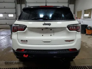 2019 Jeep Compass Trailhawk with VIN 3C4NJDDB5KT703542, listed as a Copart auction lot 54506705 with 86,178 mi miles and Salvage Title. Bid and sale history available at DreamBid. Image 6.