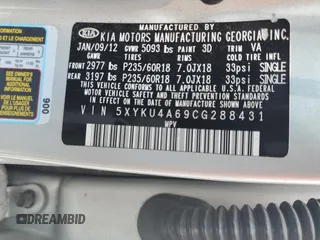 2012 Kia Sorento EX with VIN 5XYKU4A69CG288431, listed as a Copart auction lot 62986595 with 216,323 mi miles and Salvage title. Bid and sale history available at DreamBid. Image 13.