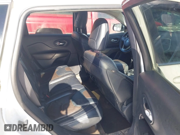 2015 Jeep Cherokee Limited with VIN 1C4PJMDS9FW718151, listed as a IAAI auction lot 41344018 with 124,185 mi miles and . Bid and sale history available at DreamBid. Image 8.