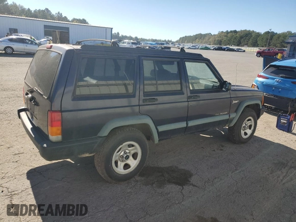1998 Jeep Cherokee Sport with VIN 1J4FT68S5WL136989, listed as a Copart auction lot 81035084 with 140,848 mi miles and Salvage Title. Bid and sale history available at carsss.com. Image 3.