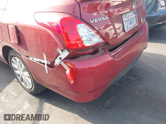 2016 Nissan Versa SV with VIN 3N1CN7AP0GL866431, listed as a IAAI auction lot 41017735 with 104,683 mi miles. Bid and sale history available at carsss.com. Image 12.