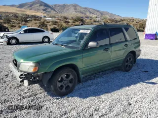 2003 Subaru Forester XS with VIN JF1SG65673H706138, listed as a Copart auction lot 77705784 with 260,423 mi miles and Salvage Title. Bid and sale history available at carsss.com. Image 1.