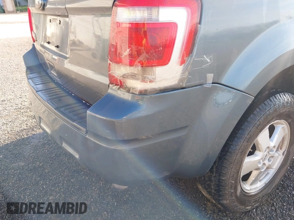 2012 Ford Escape XLT with VIN 1FMCU9D77CKB63827, listed as a IAAI auction lot 42044393 with 231,933 mi miles and . Bid and sale history available at DreamBid. Image 20.