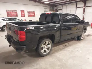 2017 Chevrolet Silverado 1500 LT with VIN 3GCUKREC6HG501307, listed as a IAAI auction lot 41611899 with 133,863 mi miles and . Bid and sale history available at DreamBid. Image 4.