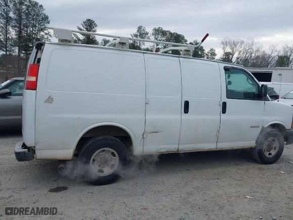 2005 Chevrolet Express Cargo Van with VIN 1GCGG25V351163463, listed as a IAAI auction lot 41407058 with 236,277 mi miles. Bid and sale history available at carsss.com. Image 13.