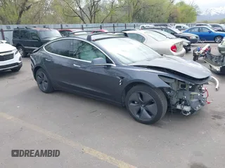 2020 Tesla Model 3 Long Range with VIN 5YJ3E1EB1LF639055, listed as a IAAI auction lot 42048009 with 43,493 mi miles. Bid and sale history available at carsss.com. Image 1.