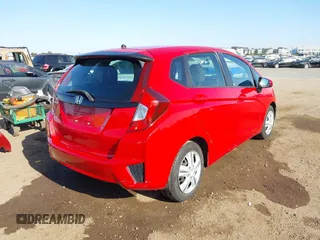 2017 Honda Fit LX with VIN JHMGK5H56HS019530, listed as a IAAI auction lot 41956001 with 88,023 mi miles. Bid and sale history available at carsss.com. Image 4.