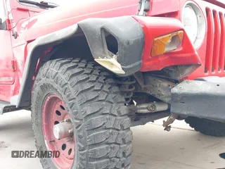 1998 Jeep Wrangler SE with VIN 1J4FY29P2WP791317, listed as a IAAI auction lot 41748523 with 169,052 mi miles. Bid and sale history available at carsss.com. Image 6.
