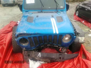 2021 Jeep Wrangler Unlimited Rubicon with VIN 1C4JJXFG3MW833275, listed as a IAAI auction lot 39371948 with 43,428 mi miles. Bid and sale history available at carsss.com. Image 6.