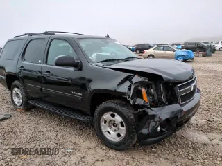 2014 Chevrolet Tahoe LT z VIN 1GNSKBE06ER131287, wystawiony jako Copart lot #82617224 z przebiegiem 138 880 mil mil oraz Szkoda całkowita • Salvage title. Historia ofert i sprzedaży dostępna na DreamBid. Obrazek 14.