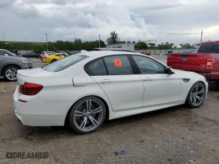 2016 BMW M5 with VIN WBSFV9C52GG343300, listed as a Copart auction lot 49419563 with 39,217 mi miles. Bid and sale history available at carsss.com. Image 3.
