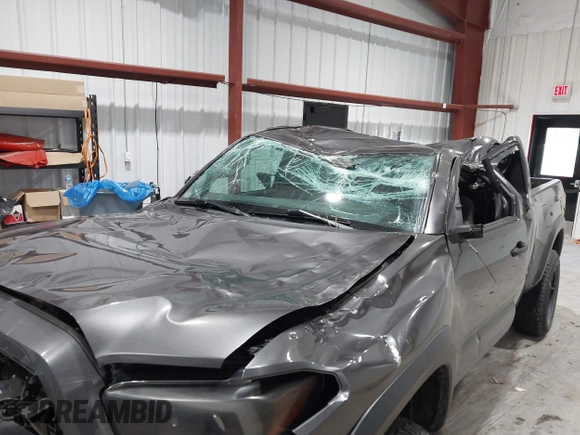 2021 Toyota Tacoma SR with VIN 3TYRX5GN8MT011370, listed as a IAAI auction lot 41287330 with 73,447 mi miles and . Bid and sale history available at DreamBid. Image 6.