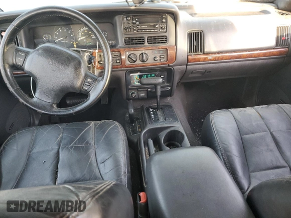 1998 Jeep Grand Cherokee Limited с VIN 1J4GZ78Y0WC260231, выставлен на аукционе Copart как лот 85149724 с пробегом 203 258 миль миль и Списание • Salvage title. История ставок и продаж доступна на DreamBid. Изображение 8.