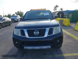 2012 Nissan Pathfinder LE with VIN 5N1AR1NN5CC607403, listed as a IAAI auction lot 41813677 with 217,854 mi miles. Bid and sale history available at carsss.com. Image 12.