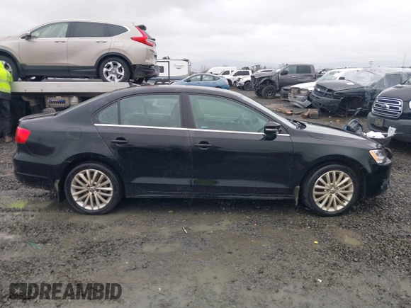 2014 Volkswagen Jetta TDI w/Premium with VIN 3VWLL7AJ1EM406360, listed as a IAAI auction lot 41857580 with 93,333 mi miles and . Bid and sale history available at DreamBid. Image 13.