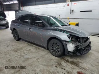 2018 Nissan Sentra S z VIN 3N1AB7AP3JY345603, wystawiony jako Copart lot #56594675 z przebiegiem 78 811 mil mil oraz Szkoda całkowita • Salvage title. Historia ofert i sprzedaży dostępna na DreamBid. Obrazek 4.