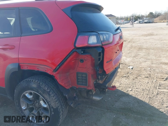 2019 Jeep Cherokee Trailhawk Elite with VIN 1C4PJMBX3KD217437, listed as a IAAI auction lot 41448614 with 85,889 mi miles. Bid and sale history available at carsss.com. Image 20.