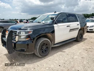 2020 Chevrolet Tahoe Commercial with VIN 1GNLCDEC9LR270589, listed as a Copart auction lot 60868145 with 74,238 mi miles and Salvage title. Bid and sale history available at DreamBid. Image 1.