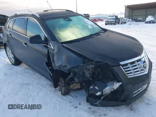 2015 Cadillac SRX Premium Collection with VIN 3GYFNGE38FS593965, listed as a IAAI auction lot 41602374 with 97,949 mi miles. Bid and sale history available at carsss.com. Image 1.