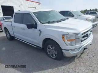 2023 Ford F-150 XL with VIN 1FTFW1E88PKD46695, listed as a IAAI auction lot 41936726 with 156,654 mi miles. Bid and sale history available at carsss.com. Image 1.