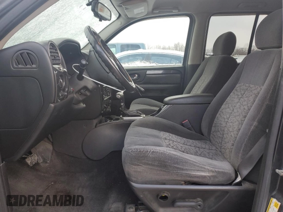 2006 GMC Envoy SLT with VIN 1GKDT13S562338202, listed as a Copart auction lot 87326504 with 158,468 mi miles and Clean Title. Bid and sale history available at carsss.com. Image 7.