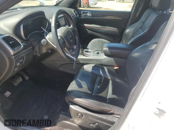 2018 Jeep Grand Cherokee Trailhawk with VIN 1C4RJFLG9JC274619, listed as a Copart auction lot 50354745 with 104,581 mi miles and Salvage title. Bid and sale history available at DreamBid. Image 7.