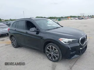 2021 BMW X1 sDrive28i with VIN WBXJG7C05M5U03116, listed as a IAAI auction lot 39837867 with 16,788 mi miles. Bid and sale history available at carsss.com. Image 1.