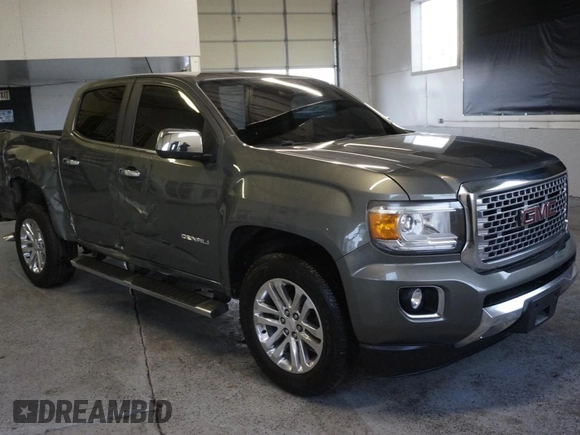 2018 GMC Canyon 2WD Denali with VIN 1GTG5EEN4J1110143, listed as a Copart auction lot 86113824 with 64,248 mi miles and Salvage Title. Bid and sale history available at carsss.com. Image 1.