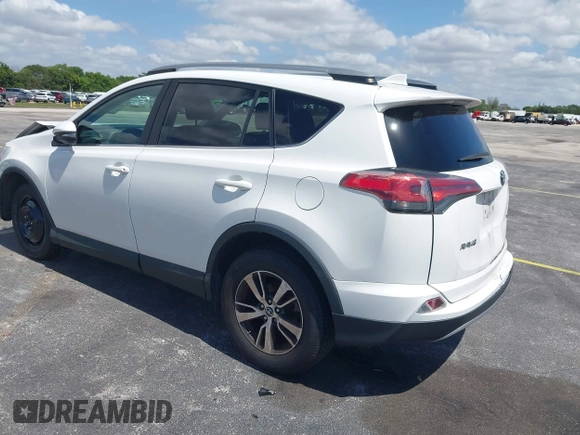 2018 Toyota RAV4 XLE with VIN 2T3WFREV9JW490324, listed as a IAAI auction lot 42298261 with 167,727 mi miles and . Bid and sale history available at DreamBid. Image 3.