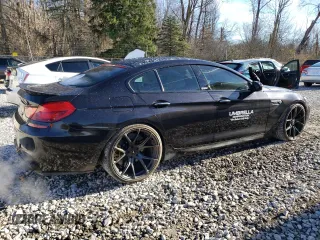 2016 BMW M6 z VIN WBS6E9C55GGF92564, wystawiony jako Copart lot #80727014 z przebiegiem 10 831 mil mil oraz Szkoda całkowita • Salvage title. Historia ofert i sprzedaży dostępna na DreamBid. Obrazek 3.